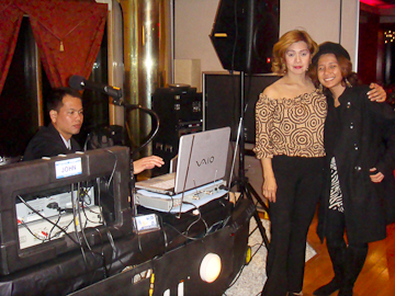 DJ booth setup with guests